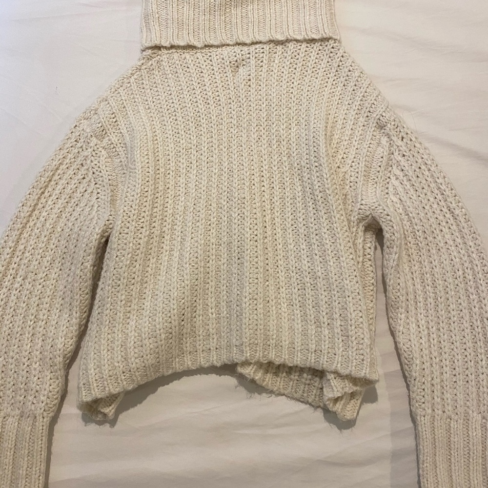 white turtleneck sweater